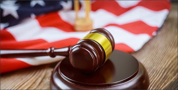 American flag and gavel depicting riots and federal authority