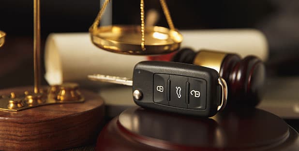 Car keys and gavel depicting how to get your driver's license back