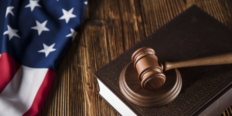 US flag, bible, and gavel depicting Church During the Pandemic: What Exactly Are Your Constitutional Rights.