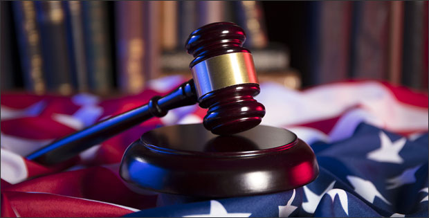 Gavel and American flag depicting Federal Crimes vs. State Crimes