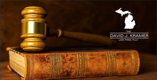 Gavel on book - Insurance fraud attorney David J. Kramer