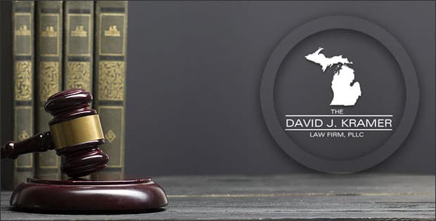 Gavel and law books depicting Lethal Force and Self-Defense in Michigan