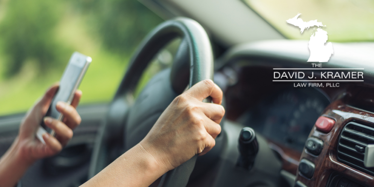 Michigan New Distracted Driving Law Proposal Penalties & Defense
