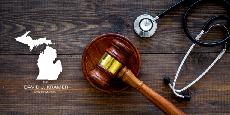 Gavel and stethoscope depicting University of Michigan Sex Abuse Scandal Involving Former UM Doctor